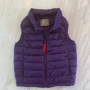 Primary Girls’s Purple Puffer Vest with Red Zipper Pull. Size 4-5.